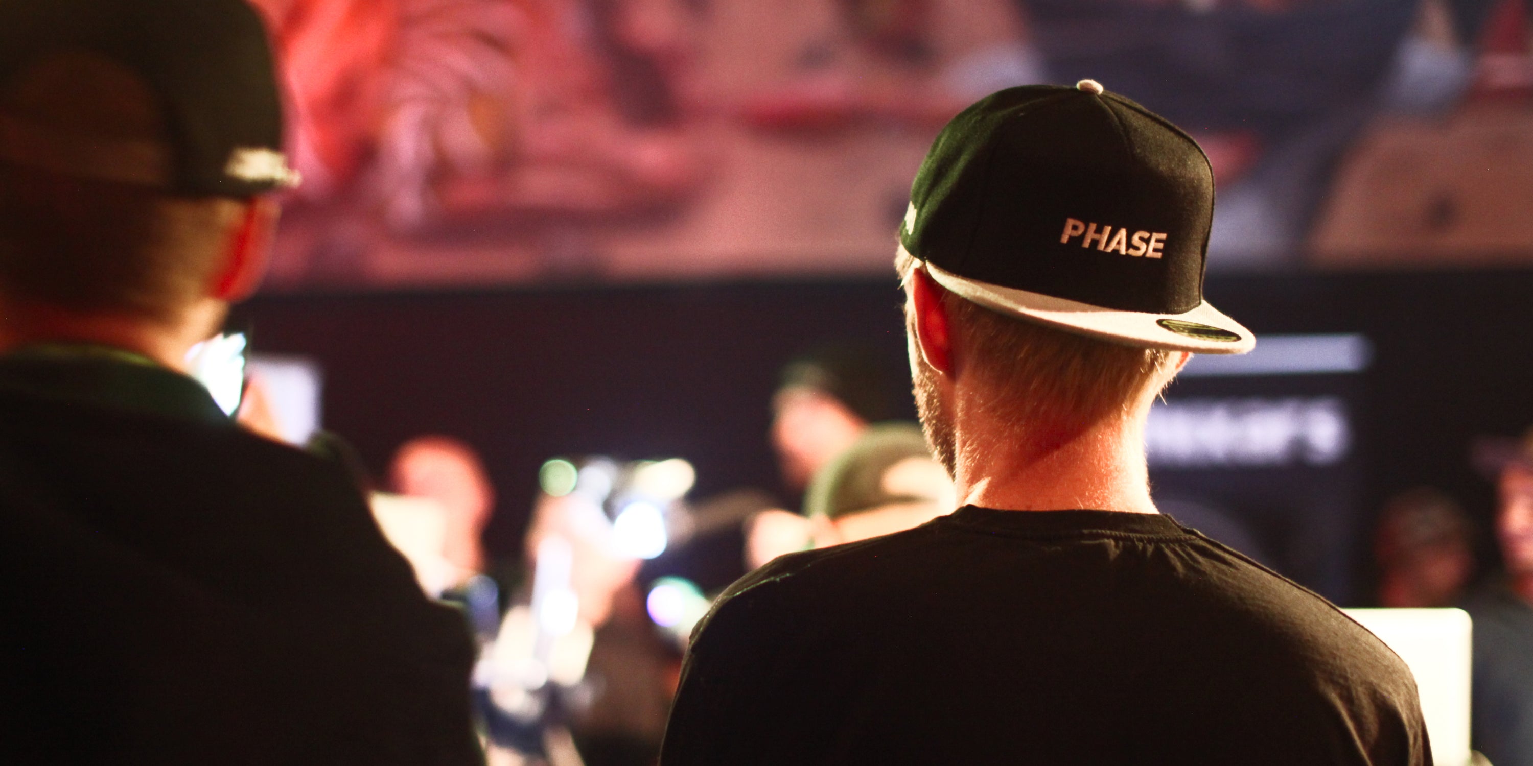 a Phase team member wearing a Phase hat